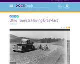 View of Ohio tourists having early breakfast on parking Area 460 to 463. The view is ahead (west)