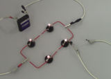 Électrocinétique - Comprendre les conditions d'un court circuit (OER-UCLouvain)