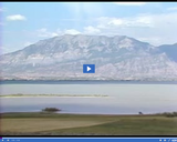 Geography of Utah. Utah's State Parks and Private Recreation. Utah Lake with Wasatch Mountains.