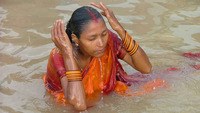 SQ3: Image - Woman Bathing in Ganges River